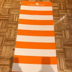 La Roche-Posay Orange and White Striped Towel​